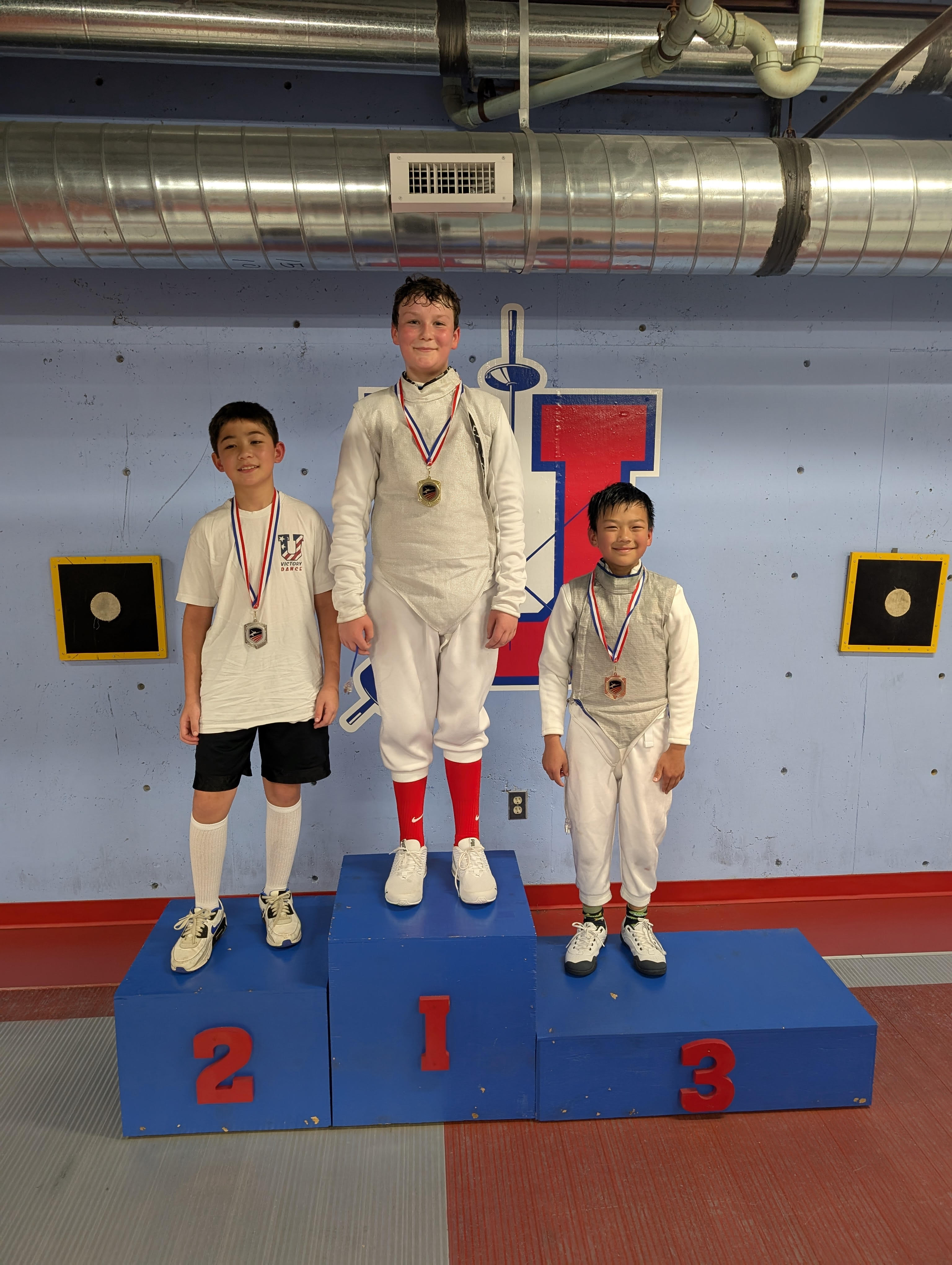 Archer Moorison Easter Clash Champion - First Place at Memphis University School Archer Moorison celebrating his first place victory at the Easter Clash foil tournament held at Memphis University School in Tennessee